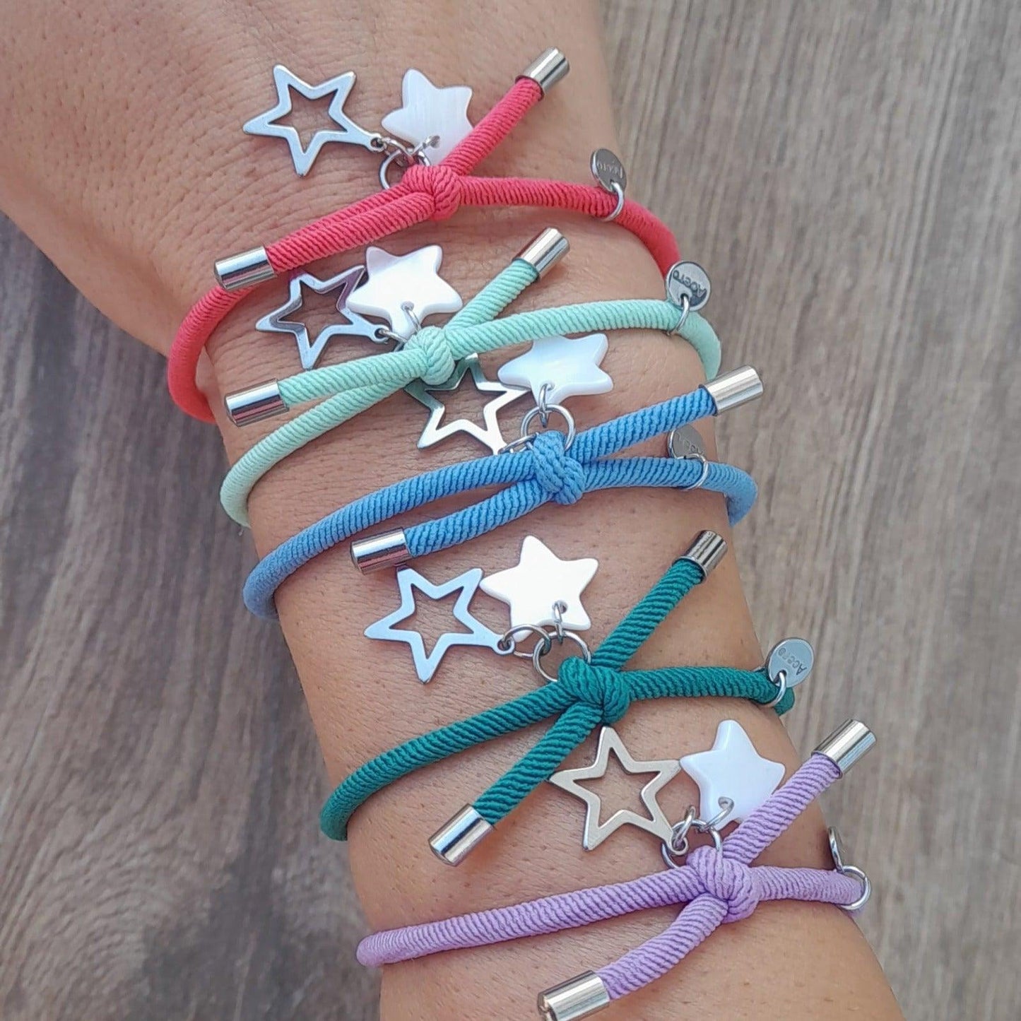 Pulsera elástica estrellas plateadas